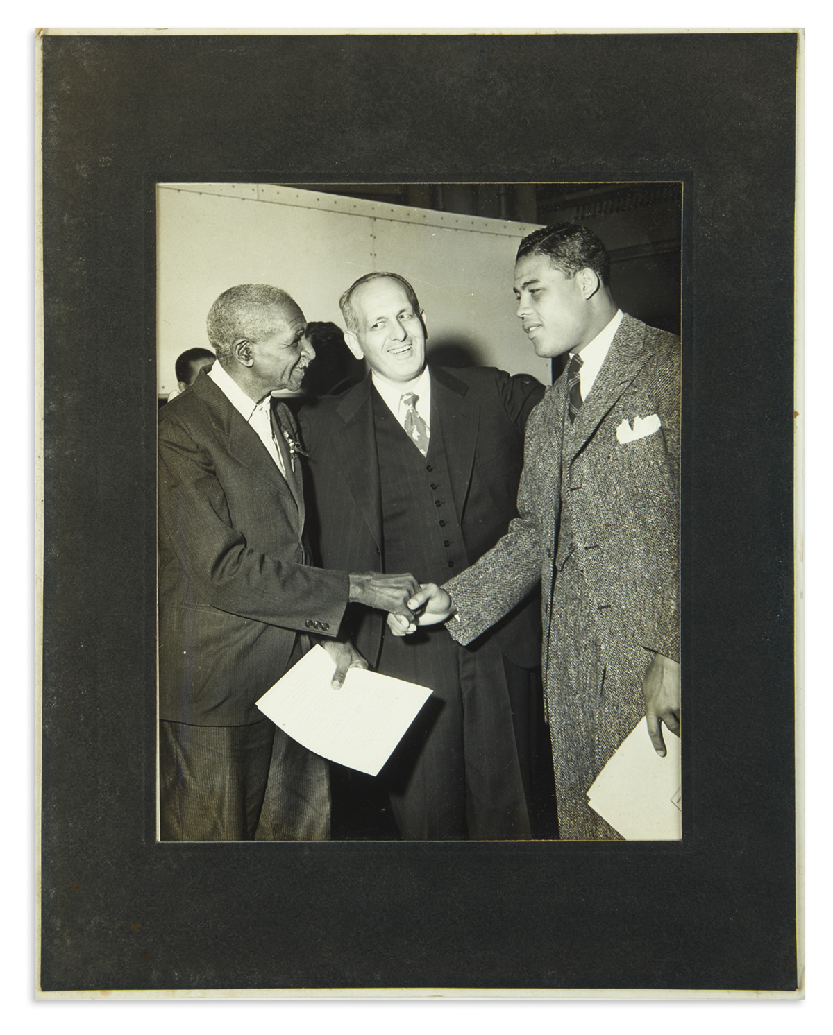 (SPORTS--BOXING.) Archive of photographs of the Brown Bomber, Joe Louis, collected by his manager Julian Black.